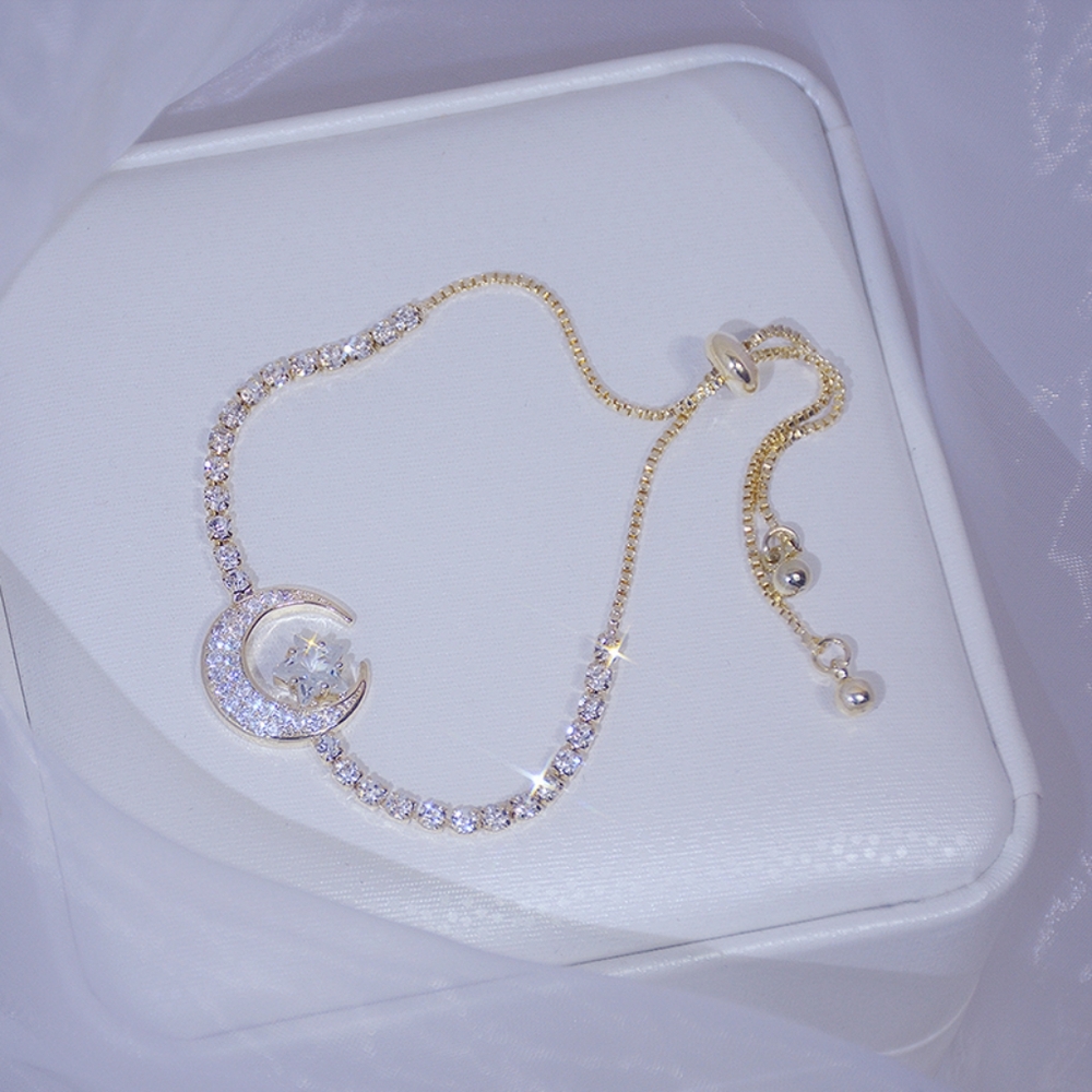 14k Gold moon and star diamond bracelet